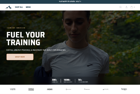 A promotional webpage screenshot for an athletic apparel and recovery brand, showing a woman outdoors over a dark green forest background with large text reading 'FUEL YOUR TRAINING' and a 'SHOP NOW' button. Visible logos at the bottom include Yeti, Hoka, and bogo.